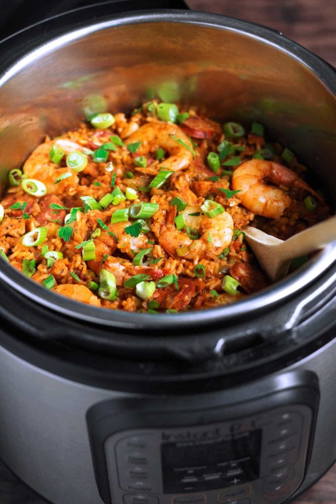 Only 15 mins prep time to make this super simple and delicious Instant Pot Jambalaya! This shrimp jambalaya is just as tasty as the traditional version, but made simple in your Instant Pot! This healthy dinner recipe is gluten free, dairy free, and made with real food ingredients. #shrimprecipe #jambalaya #instantpotrecipe