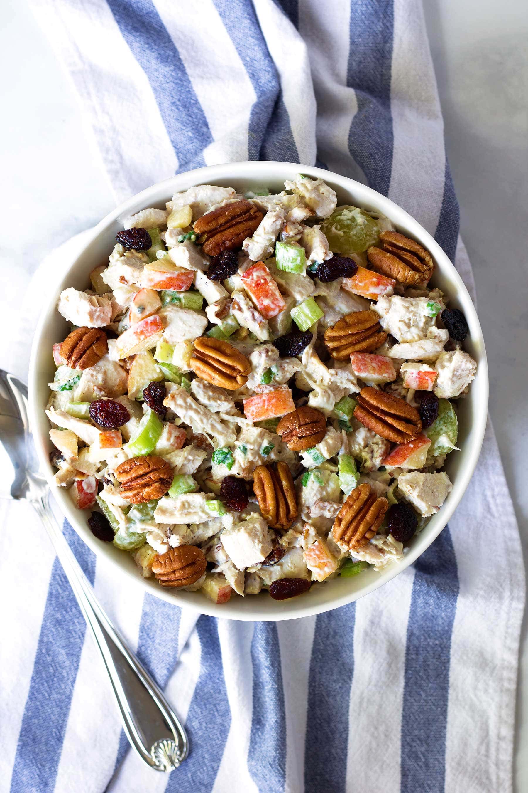 Use up your leftover turkey with this easy recipe! This Leftover Turkey Salad recipe is so simple to make, paleo, gluten free, Whole30, and can easily be made low carb and keto! 
#healthythanksgiving #healthychristmas #turkey #leftoverturkey #thanksgivingleftovers #christmasrecipes #jicama #apple #cranberries #crasins #pecans #glutenfreethanksgiving #glutenfree #ketothanksgiving #ketochristmas #lowcarbthanksgiving #lowcarbchristmas
