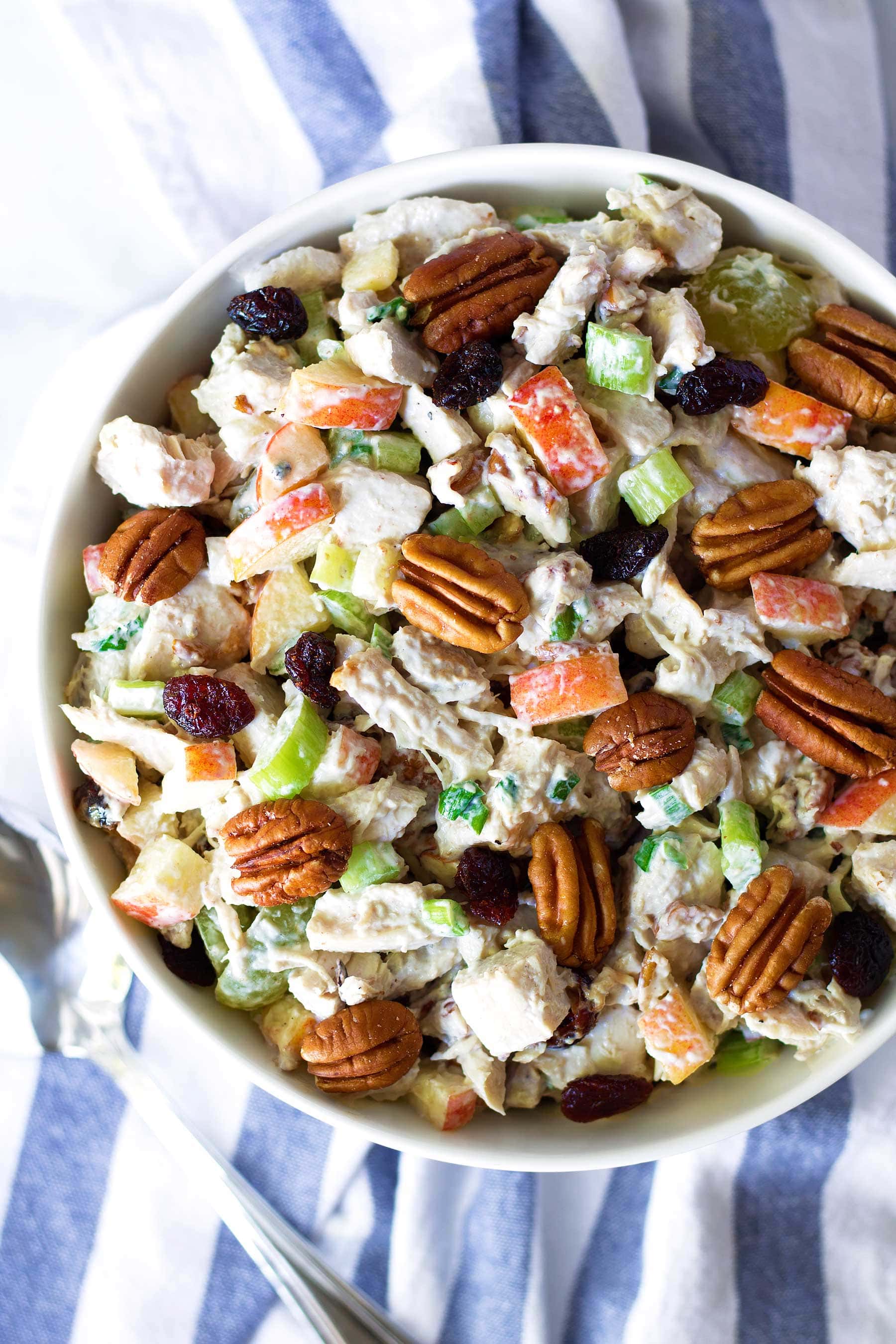 Use up your leftover turkey with this easy recipe! This Leftover Turkey Salad recipe is so simple to make, paleo, gluten free, Whole30, and can easily be made low carb and keto! 
#healthythanksgiving #healthychristmas #turkey #leftoverturkey #thanksgivingleftovers #christmasrecipes #jicama #apple #cranberries #crasins #pecans #glutenfreethanksgiving #glutenfree #ketothanksgiving #ketochristmas #lowcarbthanksgiving #lowcarbchristmas