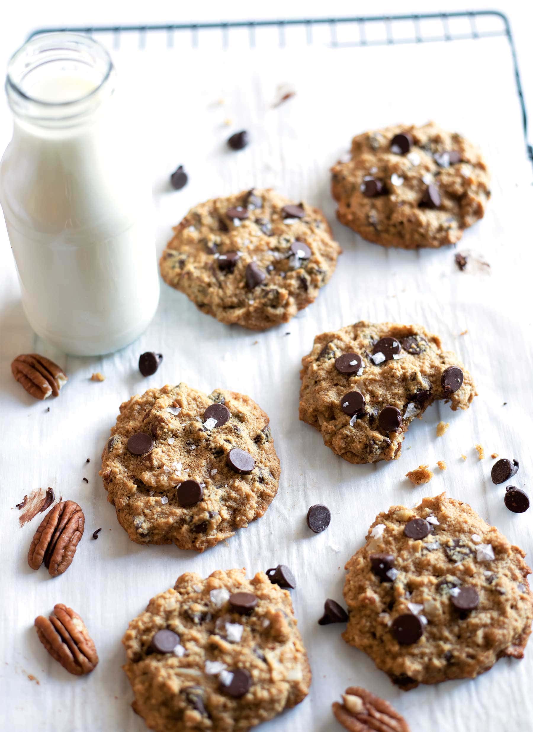 BEST COOKIES EVER in less than 30 minutes! These gluten free cowboy cookies are stuffed full of chocolate chips, pecans, coconut, and oats and are seriously addictive! They are so easy to make and can also be made low carb or paleo! These are truly the best gluten free cookies. #healthycookies #glutenfreecookies #glutenfreebaking #healthybaking #lowcarbcookies #lowcarbbaking #cowboycookies #lowcarbrecipe #healthyeating #lowcarb #paleocookies #paleobaking #refinedsugarfree