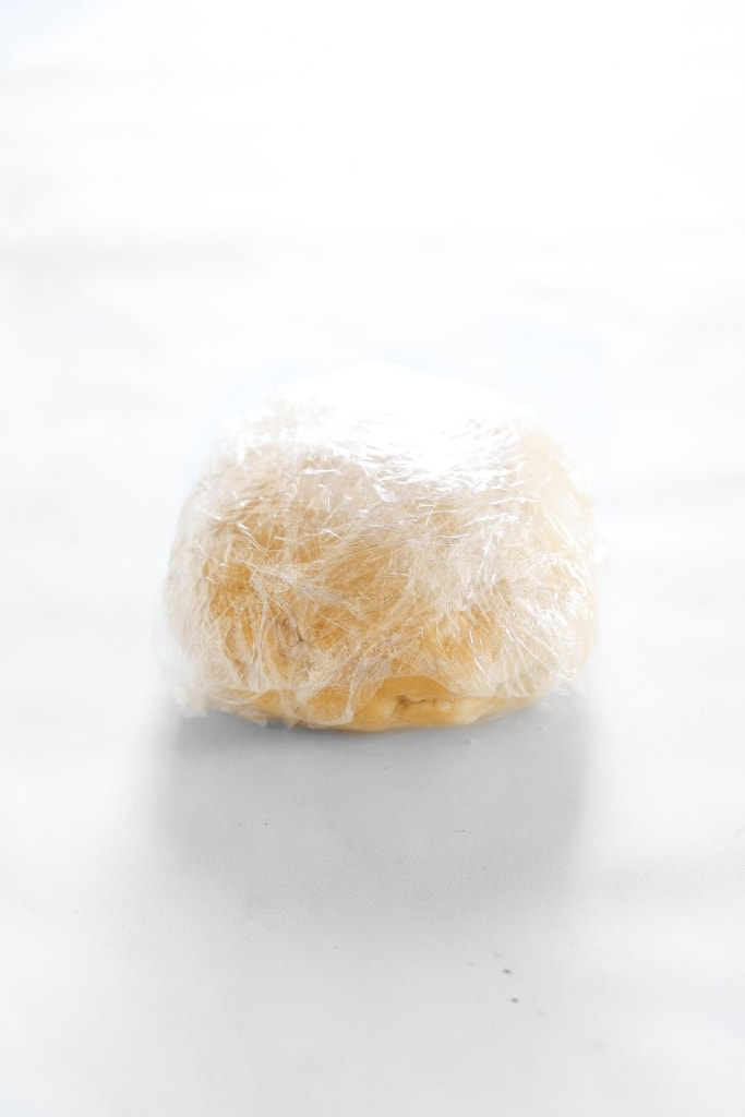 pie crust wrapped in cling wrap