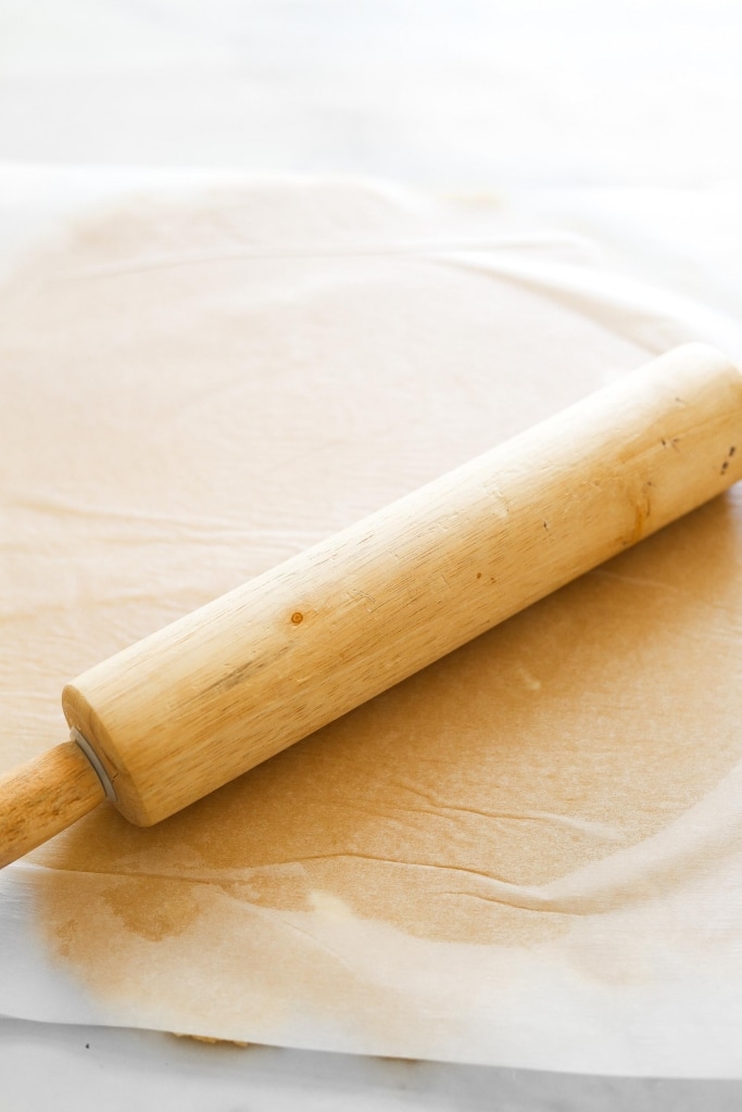 gluten free pie crust rolled out with rolling pin