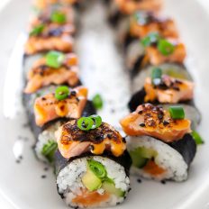 salmon roll on white plate