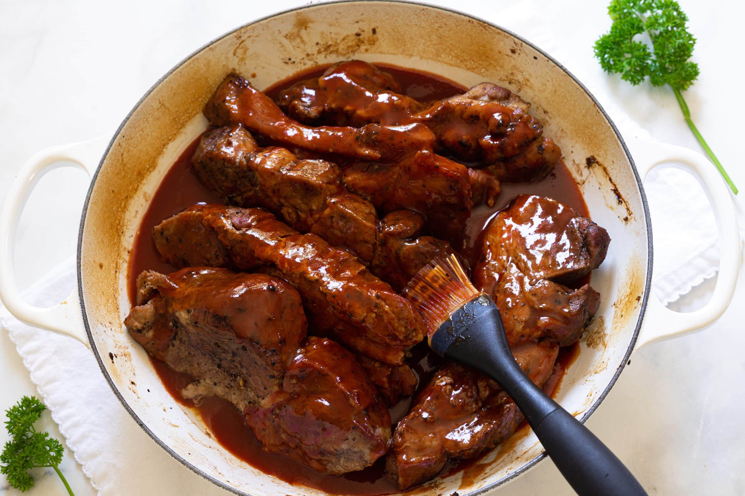 basting ribs with sauce