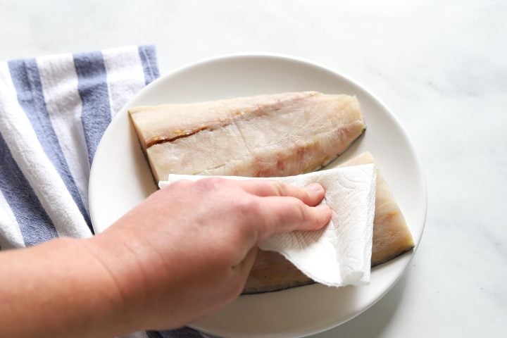 drying halibut fillets with paper towel